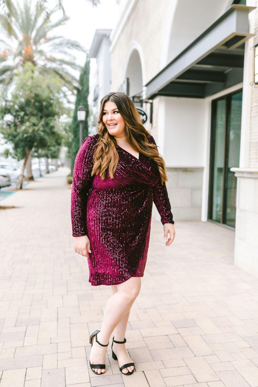 How to Layer Your Party Dresses: a plus size holiday outfit featuring a  colorful sequin dress from Lane Bryant styled with a long sleeved tee and  tights.